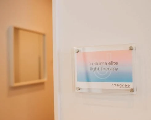 Celluma Elite Light Therapy wall sign in office.