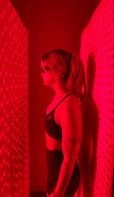 Female doing her Red Light Therapy service after a workout